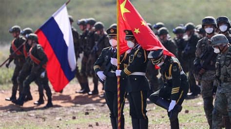 Russia approved secret China military training at top level, sources say