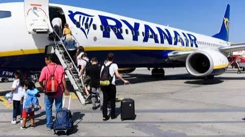 Ryanair “reluctantly” allows parents to sit with children for free