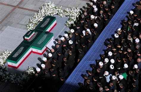 Three sons of Iran’s slain leader Khamenei appear at funeral, not his successor