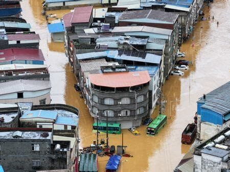 Flooding kills two in China’s Nanning as east braces for super typhoon
