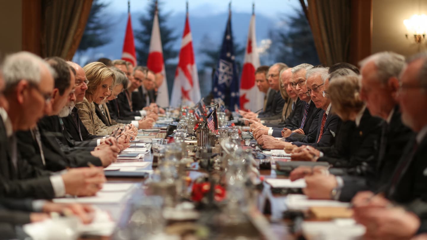 Can Guarantees Build Bridges Across Distrust?
