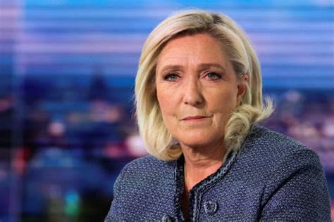Far-right French leader Le Pen able to run in next presidential election after court ruling