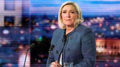 Le Pen cuts short first presidential campaign trip amid protests