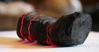 Papyrus scroll burnt to a crisp during Vesuvius eruption deciphered with help of AI