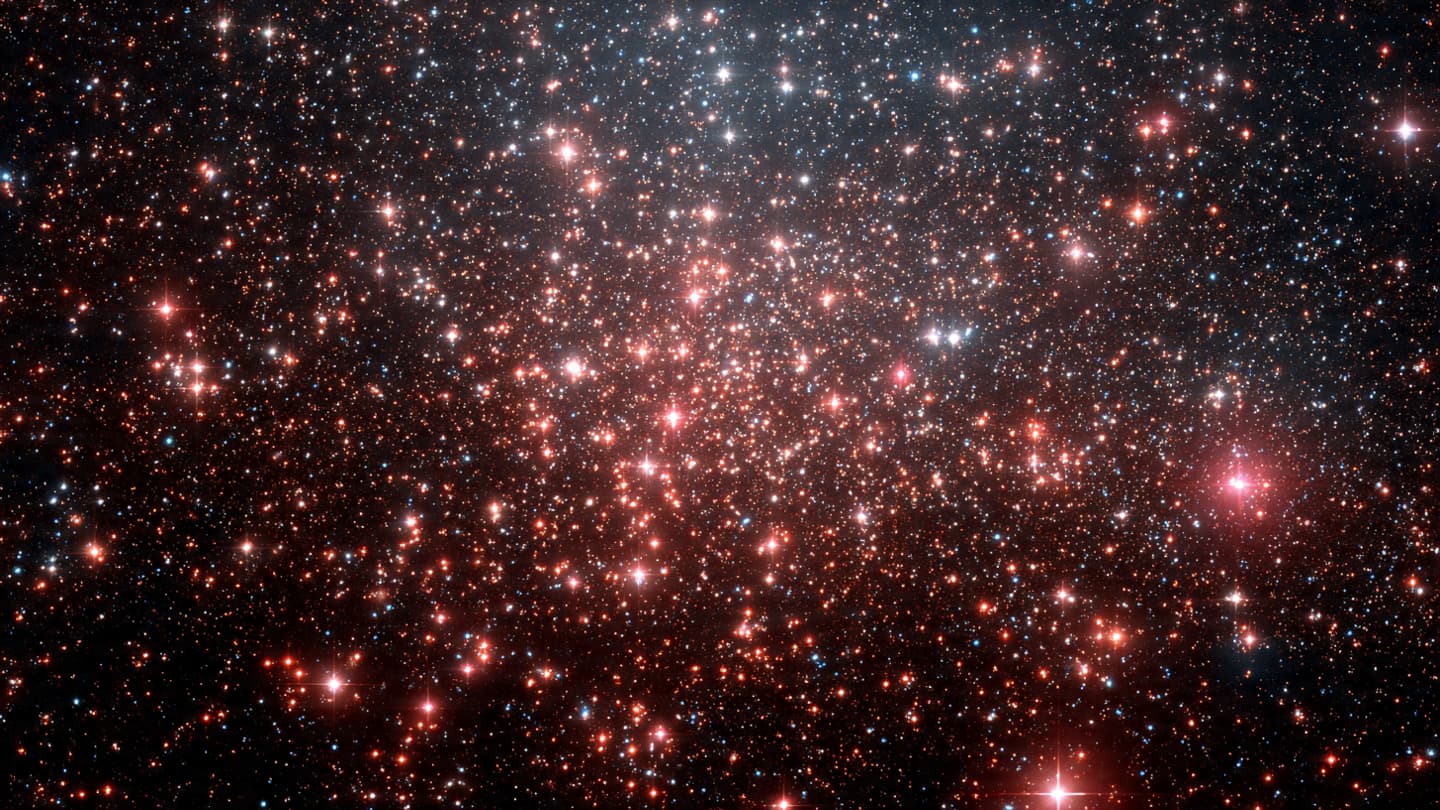 Tiny Red Lights in the Early Universe Are Raising Enormous Questions
