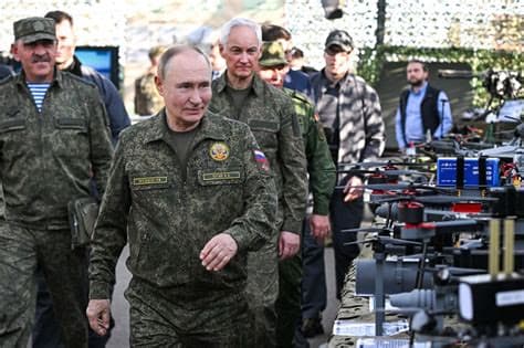 Putin in Military Uniform Issues Fresh Threats to the West