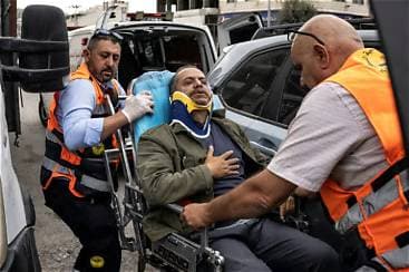 Israeli Settlers Beat AFP Photographer in West Bank as Soldiers Look On Israeli Settlers Beat AFP Photographer in West Bank as Soldiers Look On