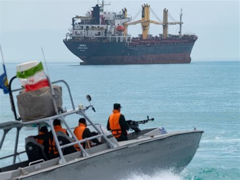 Cargo Ship Reports Being Hit in Strait of Hormuz as U.S. and Iran Dispute Details of Talks Cargo Ship Reports Being Hit in Strait of Hormuz as U.S. and Iran Dispute Details of Talks
