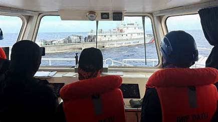 Chinese ship shoots water cannon at Philippine vessel carrying CNN crew near flashpoint shoal Chinese ship shoots water cannon at Philippine vessel carrying CNN crew near flashpoint shoal