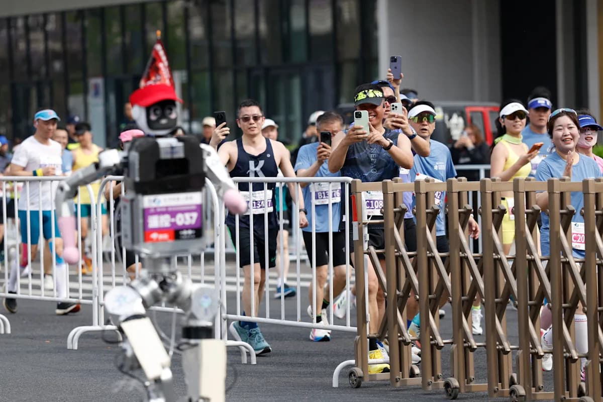 "Humanoid Robot Outruns Humans: Breaks Half-Marathon World Record in Beijing" "Humanoid Robot Outruns Humans: Breaks Half-Marathon World Record in Beijing"