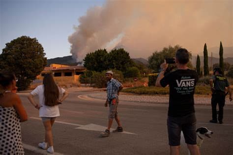 More Than 250,000 Evacuated as Wildfires Rage in France and Spain More Than 250,000 Evacuated as Wildfires Rage in France and Spain