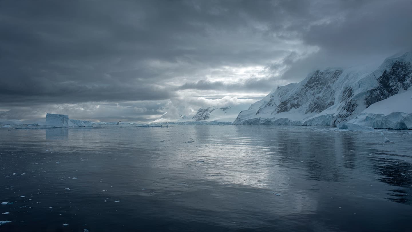 A frozen continent leans into uncertainty under shifting skies A frozen continent leans into uncertainty under shifting skies