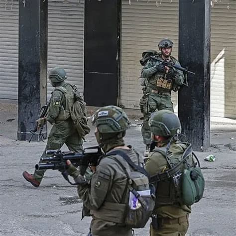 IDF Soldier Shoots and Injures Palestinian Who Posed No Apparent Threat During Settler Clash IDF Soldier Shoots and Injures Palestinian Who Posed No Apparent Threat During Settler Clash