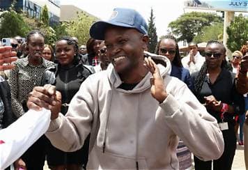 Armed men abduct Kenyan editor, employer suspects government Armed men abduct Kenyan editor, employer suspects government