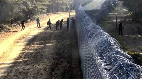 Migrants Injure Lithuanian Border Guard, Attempt to Force Him Into Belarus Migrants Injure Lithuanian Border Guard, Attempt to Force Him Into Belarus
