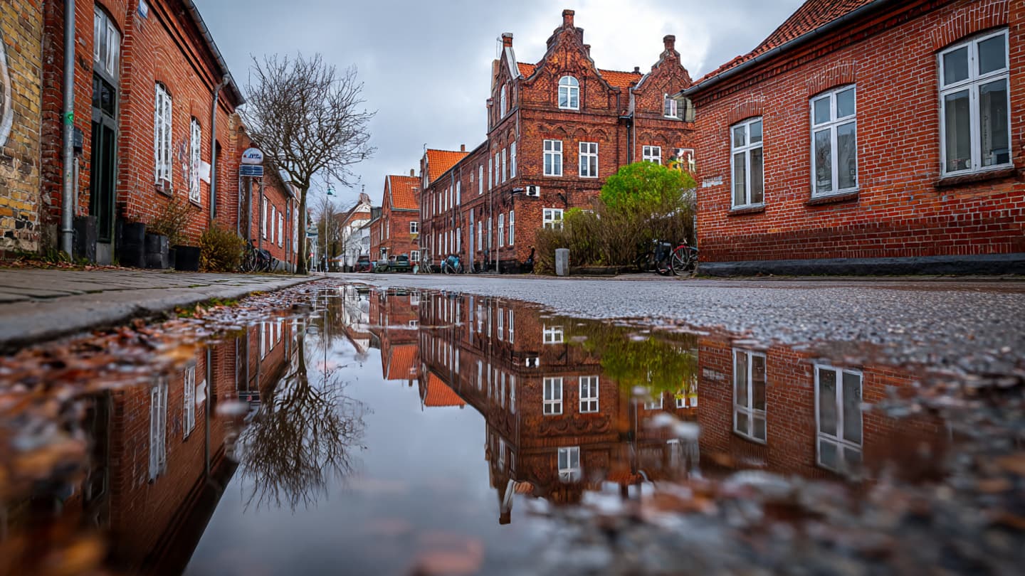 Where Silence Fractures: Odense Echoes With Unspoken Threats Beneath a Gray Danish Sky