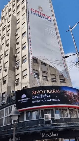 Serbian Citizens Remove Spiteful Anti-Opposition Billboard That Is Blocking Endangered Alpine Swifts from Feeding Their Young in Their Nests