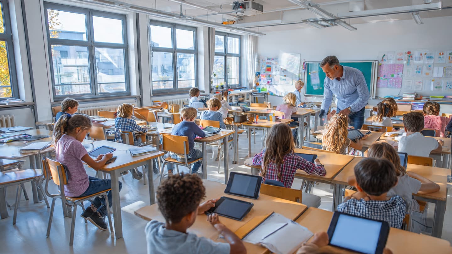 The Classroom Faces a Quiet Debate Over Machines That Teach and Listen