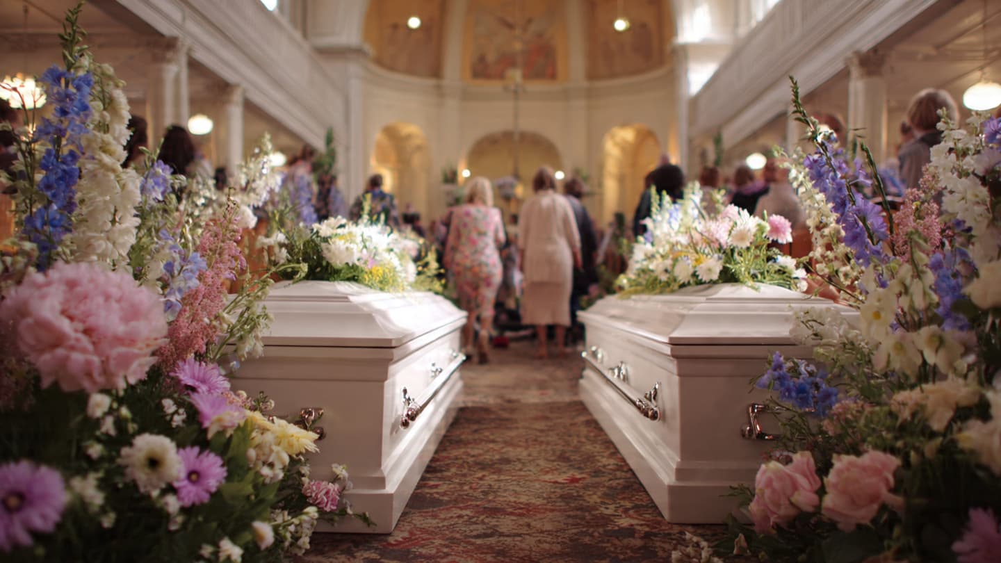 Eight Small Coffins Carried the Silence of a City Eight Small Coffins Carried the Silence of a City