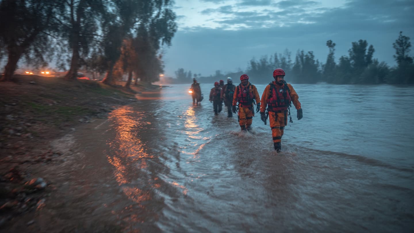 Across Flooded Streets And Rising Currents, Jordan Waits Quietly Amid Continuing Search Efforts For Missing Child